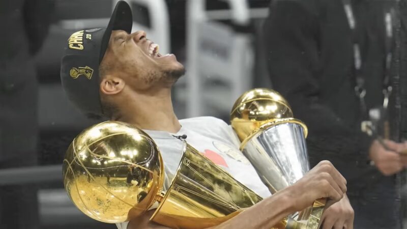 Giannis with the NBA Trophy